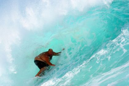 Fat guy surfer